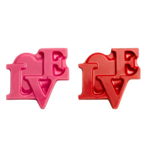 Amour chocolate decorations – naturally coloured pink and red pieces in the shape of the word LOVE